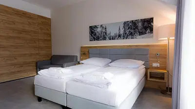 Łóżko lub łóżka w pokoju w obiekcie VacationClub - Aparthotel Czarna Góra Apartament 323
