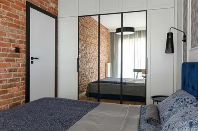 Łóżko lub łóżka w pokoju w obiekcie Central Wroclaw Apartment - City Center - One Bedroom Apartment - JP19