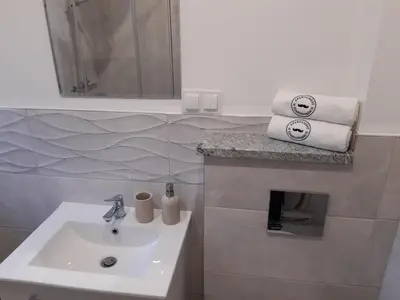 Łazienka w obiekcie Apartament w Czarnowąsach 1
