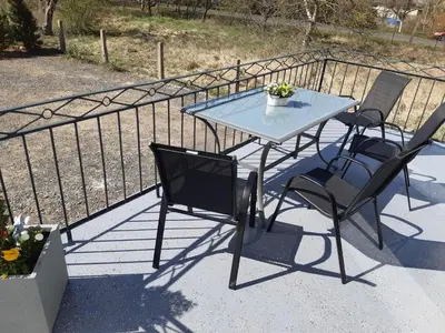 Balkon lub taras w obiekcie Apartament w Czarnowąsach 1
