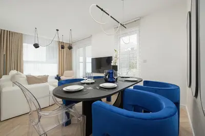 Część wypoczynkowa w obiekcie Gwiaździsta Elegant Apartment for 6 Guests with Balcony & Parking by Noclegi Renters