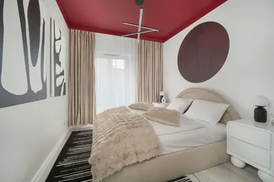 Łóżko lub łóżka w pokoju w obiekcie Luksusowe Apartamenty w Centrum Wrocławia Blisko Parku z Klimatyzacją w Salonie by Noclegi Renters