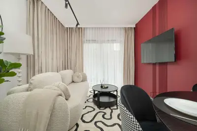 Telewizja i/lub zestaw kina domowego w obiekcie Luksusowe Apartamenty w Centrum Wrocławia Blisko Parku z Klimatyzacją w Salonie by Noclegi Renters