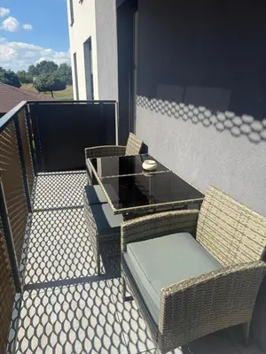 Część wypoczynkowa w obiekcie Stylowy apartament z ogródkiem i tarasem
