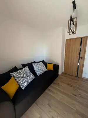 Część wypoczynkowa w obiekcie Stylowy apartament z ogródkiem i tarasem