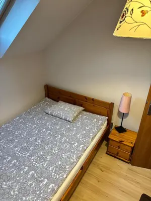 Łóżko lub łóżka w pokoju w obiekcie Agroturystyka pod lasem