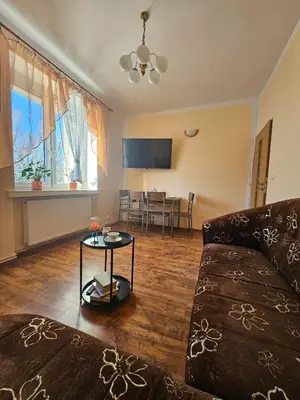 Telewizja i/lub zestaw kina domowego w obiekcie Miły Apartament