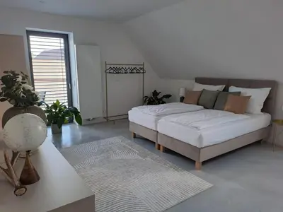 Łóżko lub łóżka w pokoju w obiekcie ArtApart