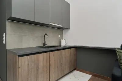 Kuchnia lub aneks kuchenny w obiekcie Rent like home - Spacious Studio with Balcony Słonimskiego 2