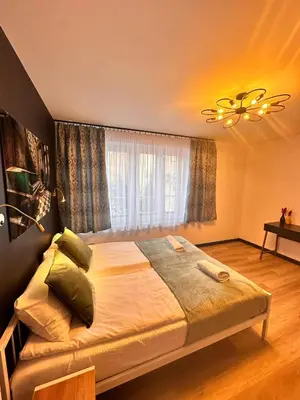 Łóżko lub łóżka w pokoju w obiekcie Apartament w Rynku - Duszniki- Zdrój