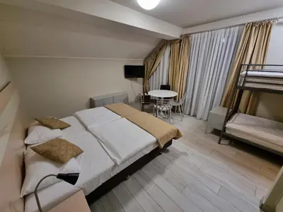 Łóżko lub łóżka w pokoju w obiekcie Apartament Czarna Góra