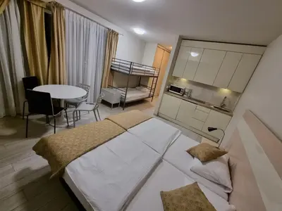 Łóżko lub łóżka w pokoju w obiekcie Apartament Czarna Góra