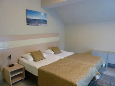 Łóżko lub łóżka w pokoju w obiekcie Apartament Czarna Góra