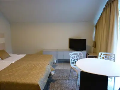 Łóżko lub łóżka w pokoju w obiekcie Apartament Czarna Góra