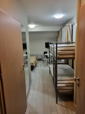 Łóżko lub łóżka w pokoju w obiekcie Apartament Czarna Góra