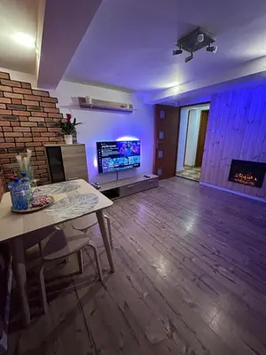 Telewizja i/lub zestaw kina domowego w obiekcie Apartment Szkocka