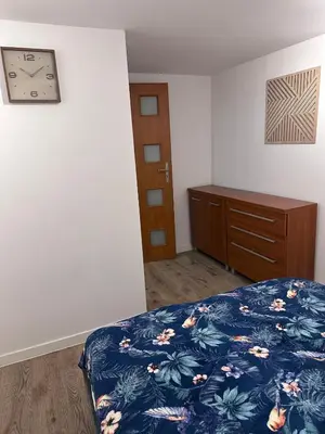 Łóżko lub łóżka w pokoju w obiekcie Apartment Szkocka