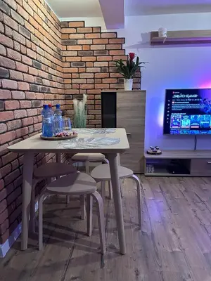 Telewizja i/lub zestaw kina domowego w obiekcie Apartment Szkocka