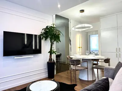 Telewizja i/lub zestaw kina domowego w obiekcie Wita Stwosza 14 Apartment - Check-In 20h - Parking
