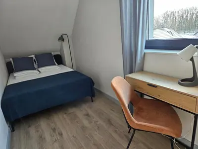 Łóżko lub łóżka w pokoju w obiekcie Apartament Vici nad jeziorem Nyskim
