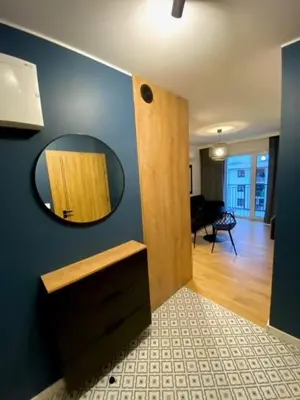 Telewizja i/lub zestaw kina domowego w obiekcie LOFT APARTAMENT IV Namysłów
