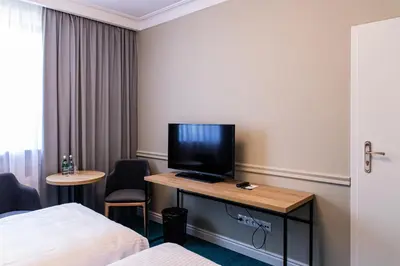 Telewizja i/lub zestaw kina domowego w obiekcie Hotel Wodnik