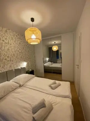 Łóżko lub łóżka w pokoju w obiekcie LOFT APARTAMENT V Namysłów