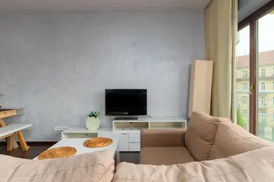 Telewizja i/lub zestaw kina domowego w obiekcie Wyspa Słodowa Serenity Studio by BookingHost