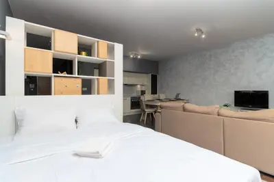 Telewizja i/lub zestaw kina domowego w obiekcie Wyspa Słodowa Serenity Studio by BookingHost