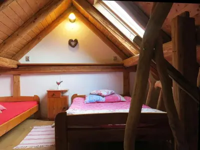 Łóżko lub łóżka w pokoju w obiekcie Domek z kominkiem w Górach Kaczawskich