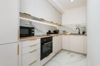 Kuchnia lub aneks kuchenny w obiekcie Kairos Apartments - Onyx - darmowy parking, ścisłe centrum