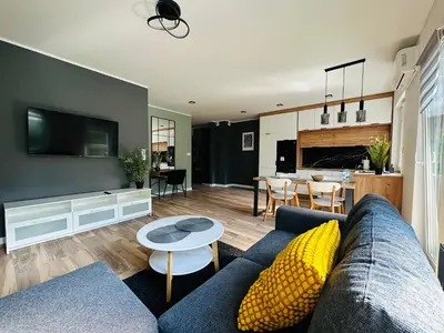 Część wypoczynkowa w obiekcie Apartamenty Dębowa 8 Leśny Zakątek