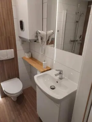 Łazienka w obiekcie W KORONACH DRZEW Apartamenty Polanica-Zdrój