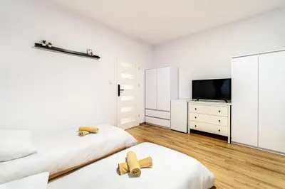 Telewizja i/lub zestaw kina domowego w obiekcie Hostel PW INVEST HOME
