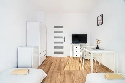 Telewizja i/lub zestaw kina domowego w obiekcie Hostel PW INVEST HOME