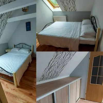 Łóżko lub łóżka w pokoju w obiekcie Domek Chrzanówka