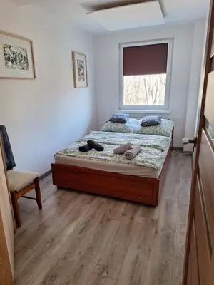 Łóżko lub łóżka w pokoju w obiekcie Mała dziupla