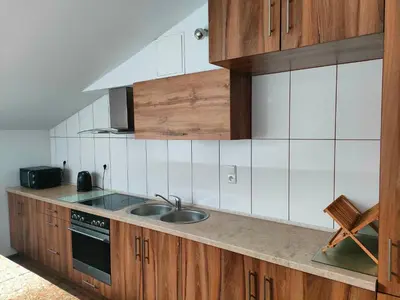 Kuchnia lub aneks kuchenny w obiekcie Pokoje Gościnne pod Dębem