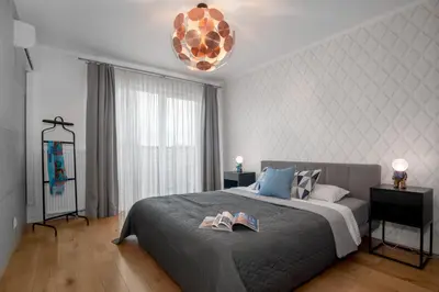 Łóżko lub łóżka w pokoju w obiekcie Premium Island Apartment, Tectum Apartments