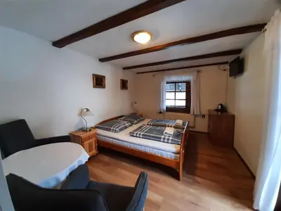 Łóżko lub łóżka w pokoju w obiekcie Willa Krokus
