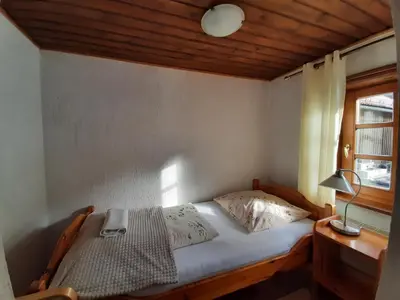 Łóżko lub łóżka w pokoju w obiekcie Willa Krokus