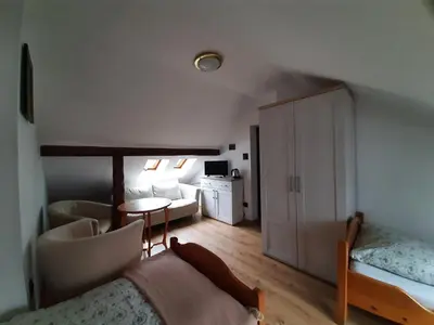 Łóżko lub łóżka w pokoju w obiekcie Willa Krokus
