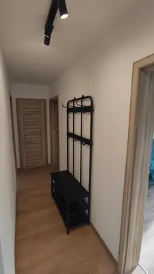 Łóżko lub łóżka w pokoju w obiekcie Apartament Gagarina