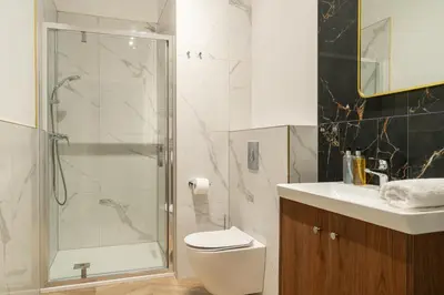 Łazienka w obiekcie RentPlanet - Apartamenty przy Ogrodzie Botanicznym