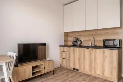 Kuchnia lub aneks kuchenny w obiekcie RentPlanet - Studio Zwycięska