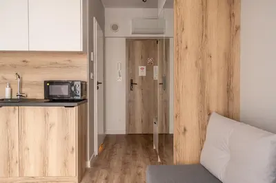 Kuchnia lub aneks kuchenny w obiekcie RentPlanet - Studio Zwycięska