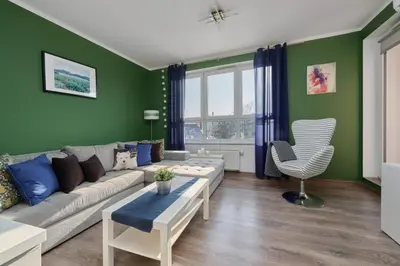 Część wypoczynkowa w obiekcie Lively Green Apartment in Wrocław with Balcony and Desk by Noclegi Renters