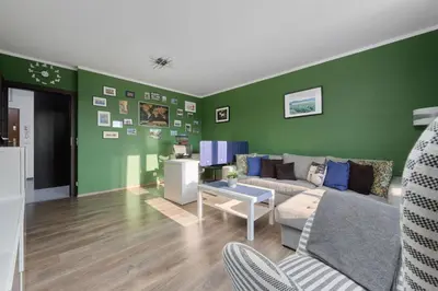 Część wypoczynkowa w obiekcie Lively Green Apartment in Wrocław with Balcony and Desk by Noclegi Renters