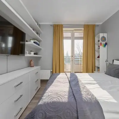 Lively Green Apartment in Wrocław with Balcony and Desk by Noclegi Renters