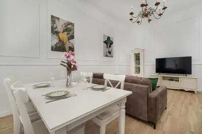Telewizja i/lub zestaw kina domowego w obiekcie Jedności Narodowej Stylowy Apartament Wrocław by Noclegi Renters